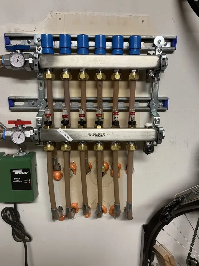 Plumber performing Gas Leak Detection at a residential property in Lawrence